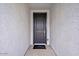Inviting front entrance featuring a stylish door and a decorative welcome mat at 4312 E Bradford Ave, San Tan Valley, AZ 85143