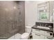 Modern bathroom with a walk-in shower and a single vanity at 4802 N 46Th St, Phoenix, AZ 85018