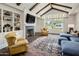 Cozy Gathering room with a fireplace, built-in shelving, and comfortable seating at 4802 N 46Th St, Phoenix, AZ 85018