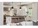 White kitchen with large island and stainless steel appliances at 4802 N 46Th St, Phoenix, AZ 85018