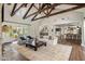 Open concept living area with hardwood floors and kitchen views at 4802 N 46Th St, Phoenix, AZ 85018