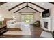 Luxurious main bedroom featuring a fireplace and backyard access at 4802 N 46Th St, Phoenix, AZ 85018