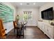 Home office with a large desk, comfortable chair, and plenty of natural light at 4802 N 46Th St, Phoenix, AZ 85018