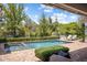 Refreshing pool and spa surrounded by lush landscaping at 4802 N 46Th St, Phoenix, AZ 85018