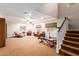 Finished basement with exercise equipment and stairs at 5535 E Sheena Dr, Scottsdale, AZ 85254