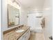 Clean bathroom boasts granite countertop, updated vanity, and a bathtub at 5535 E Sheena Dr, Scottsdale, AZ 85254