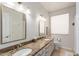 Bathroom with double vanity and granite countertop at 5535 E Sheena Dr, Scottsdale, AZ 85254