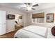 Bedroom with mirrored closet doors and window at 5535 E Sheena Dr, Scottsdale, AZ 85254