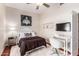 Bedroom with a desk and chair, plus a bed at 5535 E Sheena Dr, Scottsdale, AZ 85254