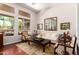 Bright and airy living room with hardwood floors and large windows at 5535 E Sheena Dr, Scottsdale, AZ 85254