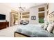 Main bedroom with patio access and sitting area at 5535 E Sheena Dr, Scottsdale, AZ 85254