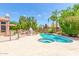 Relaxing pool area with spa and outdoor entertaining space at 5535 E Sheena Dr, Scottsdale, AZ 85254