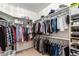 Large walk-in closet with ample shelving and hanging space at 5535 E Sheena Dr, Scottsdale, AZ 85254