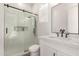 Updated bathroom with a walk-in shower and quartz countertop at 7130 W Rowel Rd, Peoria, AZ 85383