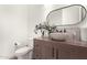 Modern bathroom with a stone vessel sink and updated vanity at 7130 W Rowel Rd, Peoria, AZ 85383
