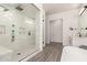 Elegant bathroom with a large walk-in shower and a separate soaking tub at 7130 W Rowel Rd, Peoria, AZ 85383