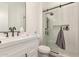 Stylish bathroom with a walk-in shower and a white vanity at 7130 W Rowel Rd, Peoria, AZ 85383