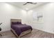 Comfortable bedroom with a queen bed and plenty of natural light at 7130 W Rowel Rd, Peoria, AZ 85383