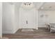 Bright entryway with double doors, hardwood floors, and chandelier at 7130 W Rowel Rd, Peoria, AZ 85383