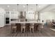 Modern kitchen with a spacious island and white cabinetry at 7130 W Rowel Rd, Peoria, AZ 85383