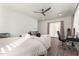 Bright bedroom with plush bedding and private access to patio at 7130 W Rowel Rd, Peoria, AZ 85383