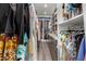 Large walk-in closet with ample shelving and hanging space at 7130 W Rowel Rd, Peoria, AZ 85383