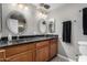 Bathroom with dual sinks and granite countertop at 10322 W Manzanita Dr, Sun City, AZ 85373