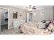 Bedroom with dresser, double bed and access to closet at 10322 W Manzanita Dr, Sun City, AZ 85373
