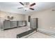 Spacious bedroom with wood-look floors and ample dresser space at 10322 W Manzanita Dr, Sun City, AZ 85373
