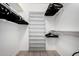 Large closet with shelving and hanging rods at 10322 W Manzanita Dr, Sun City, AZ 85373