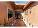 Covered entryway with tiled flooring and decorative accents at 10322 W Manzanita Dr, Sun City, AZ 85373