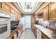 Modern kitchen with ample cabinetry and stainless steel appliances at 10322 W Manzanita Dr, Sun City, AZ 85373
