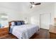 Spacious main bedroom with large bed and wood dresser at 11596 W Sierra Dawn Blvd # 357, Surprise, AZ 85378