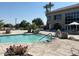 Inviting community pool with surrounding patio and landscaping at 12432 W Fieldstone Dr, Sun City West, AZ 85375