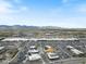 Aerial view of a large shopping center with ample parking at 13172 N 174Th Dr, Surprise, AZ 85388