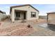 Landscaped backyard with patio, fire pit, and gazebo at 13172 N 174Th Dr, Surprise, AZ 85388