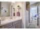 Neat bathroom with a single vanity and a view of the shower at 15834 S 177Th Ave, Goodyear, AZ 85338
