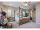 Main bedroom with a large canopy bed and plenty of closet space at 15834 S 177Th Ave, Goodyear, AZ 85338