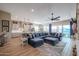 Open concept living space with a sectional sofa and kitchen views at 15834 S 177Th Ave, Goodyear, AZ 85338