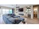 Living room with sectional sofa, fireplace, and powder room at 15834 S 177Th Ave, Goodyear, AZ 85338