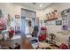 Bright and spacious home office with a desk, comfortable chair, and sliding barn doors at 15834 S 177Th Ave, Goodyear, AZ 85338
