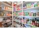 Well-organized pantry with ample shelving for food storage at 15834 S 177Th Ave, Goodyear, AZ 85338