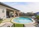 Relaxing pool and patio area with lounge chairs at 15834 S 177Th Ave, Goodyear, AZ 85338