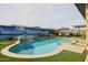 Relaxing kidney-shaped pool with a waterfall feature at 15834 S 177Th Ave, Goodyear, AZ 85338