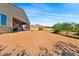Large backyard with desert landscaping and mountain views at 1623 E Hidalgo St, Apache Junction, AZ 85119