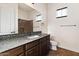 Bathroom with granite countertop and tiled floor at 1623 E Hidalgo St, Apache Junction, AZ 85119