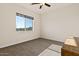 Bedroom with mountain views and ceiling fan at 1623 E Hidalgo St, Apache Junction, AZ 85119