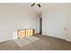 Spacious bedroom with double doors and carpet flooring at 1623 E Hidalgo St, Apache Junction, AZ 85119