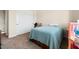 Bright bedroom with double doors and carpet flooring at 1623 E Hidalgo St, Apache Junction, AZ 85119