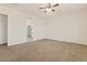Primary bedroom with carpet and en-suite bathroom at 1623 E Hidalgo St, Apache Junction, AZ 85119